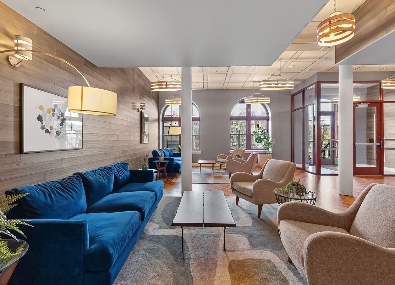 Photo of the lobby area of 2 River Street looking from the seating area to the main windows.