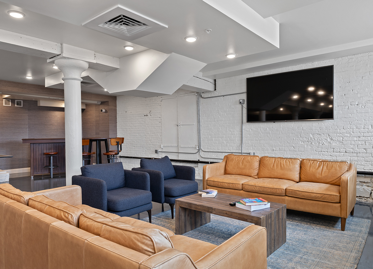 Photo of the recreation room seating area at 2 River Street.