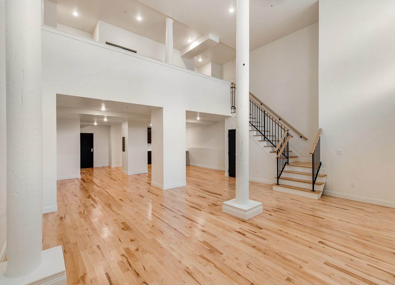 Photo of the living area of a two floor apartment at 2 River Street.